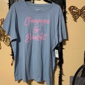 #137 size 1 Torrid NWT Tee w/ Pink Script “champagne for breakfast”